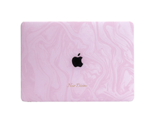 Peonia vegan leather MacBook case in blush-pink marbled swirl pattern on a MacBook
